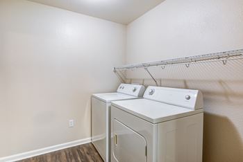 Full-sized side-by-side washer & dryer at Harvest Park Apartments